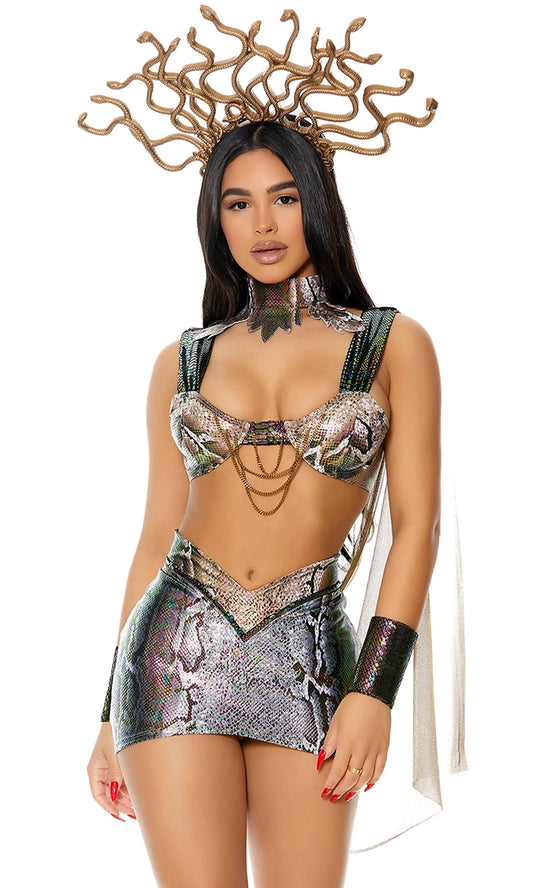 Model wearing a sexy Medusa costume featuring a metallic snake-print bra top with chains, matching mini skirt, choker, wristlets, and snake crown headpiece.